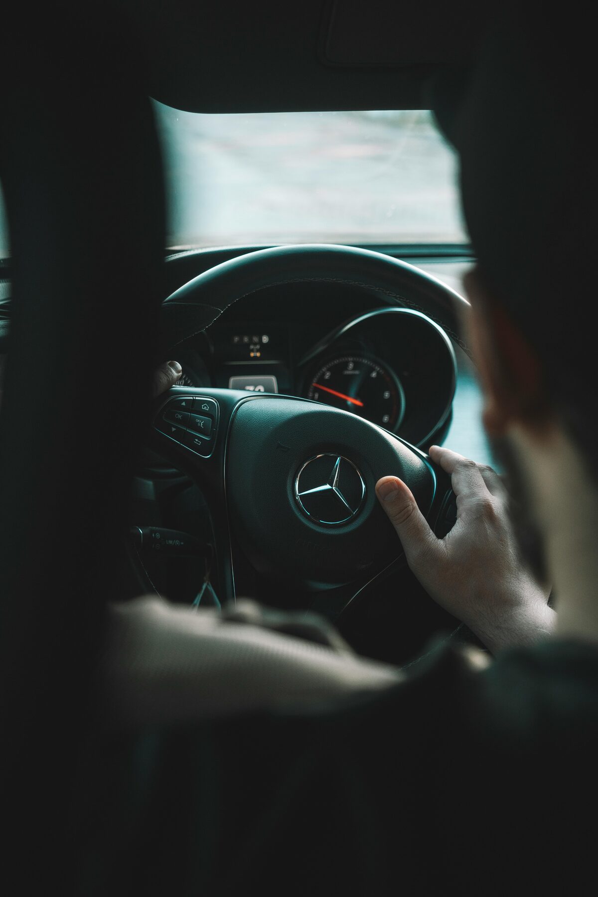 LXRIDE driver behind the wheel of a Mercedes
