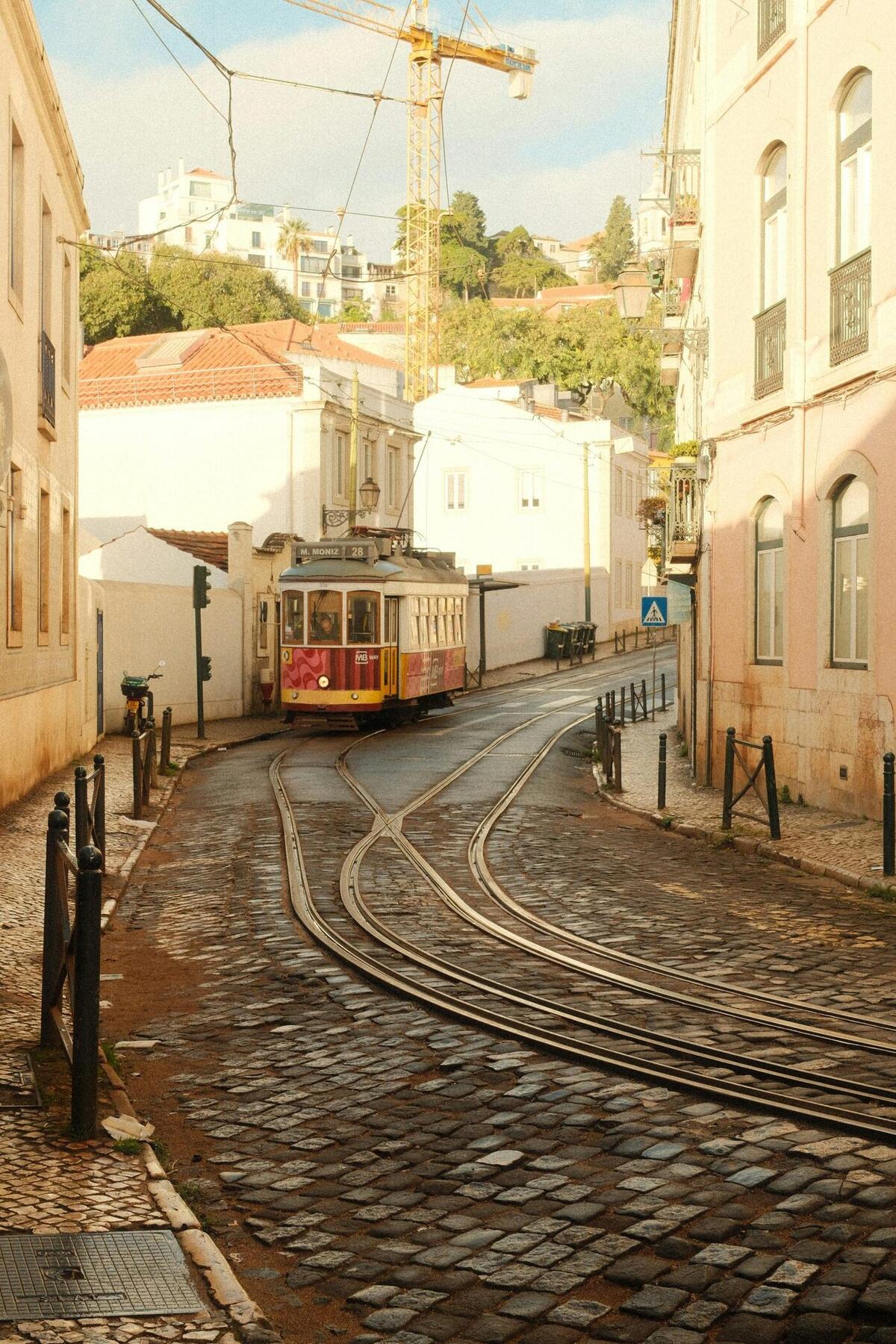 Tram 28 in Alfama, Lisbon, at golden hour